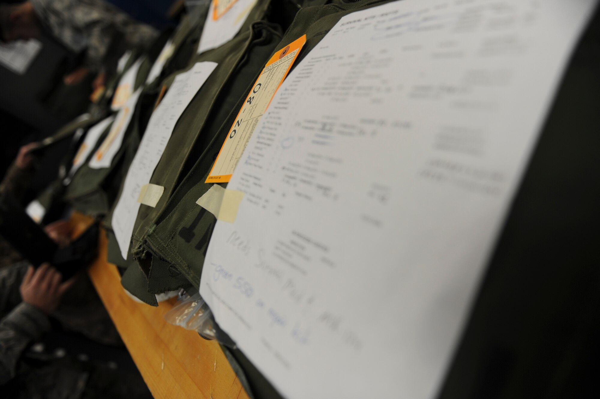 Multiple ML-4 survival kits are packed at the 4th Special Operations Squadron aircrew flight equipment shop at Hurlburt Field, Fla., Dec. 4, 2105. Survival kits include items that will assist in life-preserving in case of an emergency. (U.S. Air Force photo by Senior Airman Krystal M. Garrett) 
