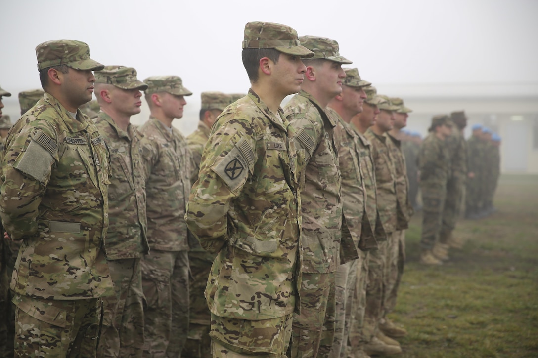 U.S. soldiers commemorate the 74th anniversary of the attack on Pearl Harbor during a ceremony on Mihail Kogalniceanu Air Base, Romania, Dec. 7, 2015. U.S. Marine Corps photo by Cpl. Kaitlyn V. Klein
