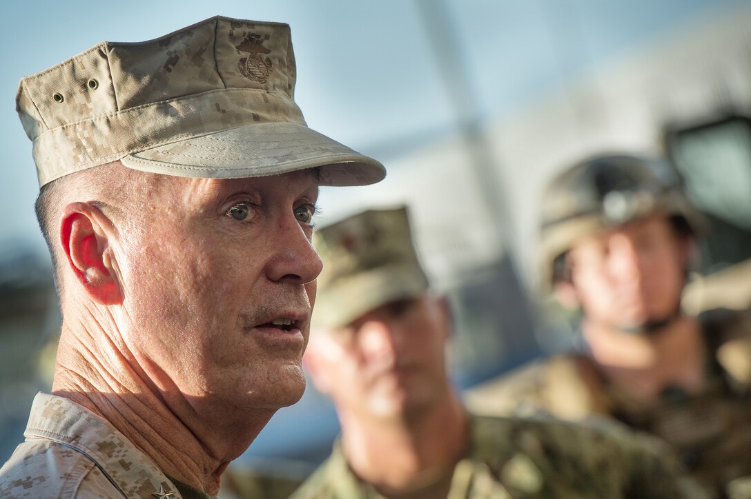 U.S. Marine Gen. Joseph F. Dunford Jr., chairman of the Joint Chiefs of Staff, talks with U.S. sailors during his visit on Camp Lemonnier, Djibouti, Dec 6, 2015. Dunford is traveling with USO entertainers to visit troops during the holiday season. DoD photo by D. Myles Cullen