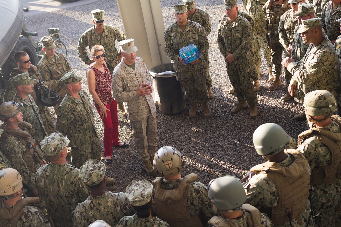 U.S. Marine Gen. Joseph F. Dunford Jr., chairman of the Joint Chiefs of Staff, talks with U.S. sailors during his visit on Camp Lemonnier, Djibouti, Dec 6, 2015. Dunford is joined with USO entertainers as they travel to various locations to visit service members who are deployed from home during the holidays. DoD photo by D. Myles Cullen