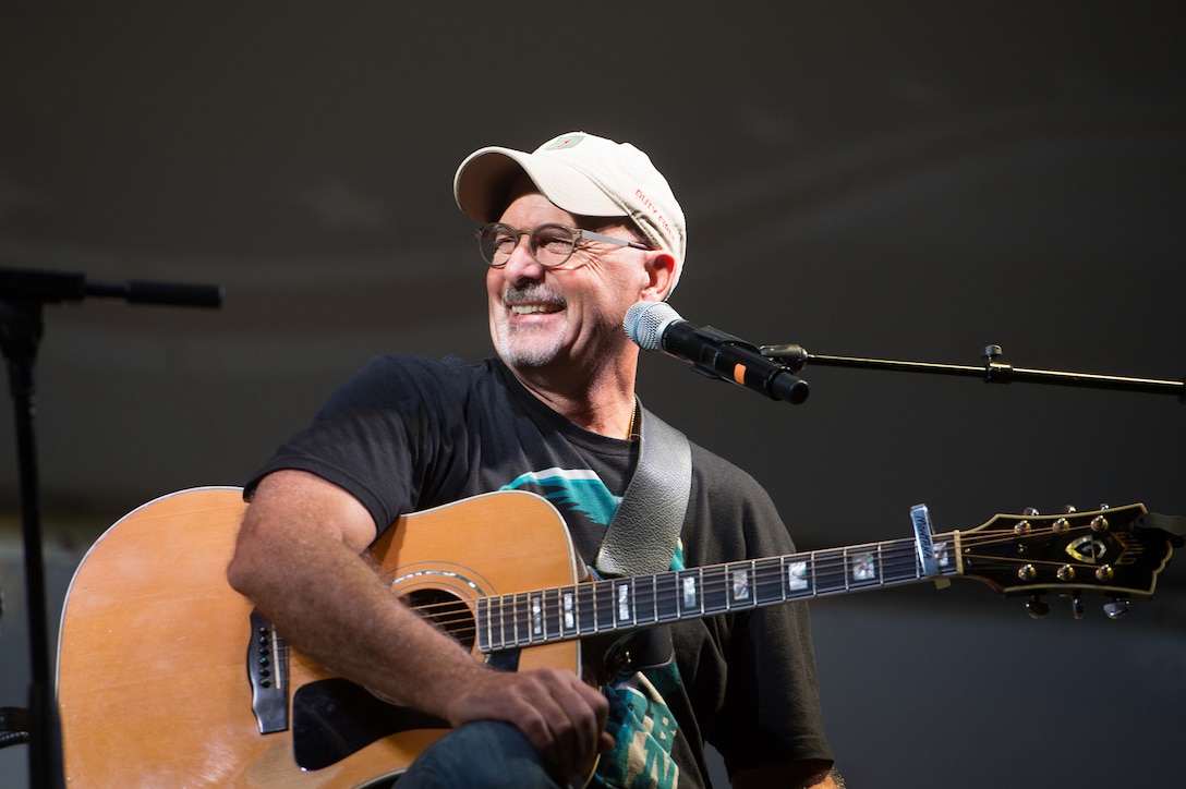 Billy Montana, singer and songwriter, performs during a USO show for U.S. service members assigned to Camp Lemonnier, Djibouti, Dec 6, 2015. DoD photo by D. Myles Cullen
