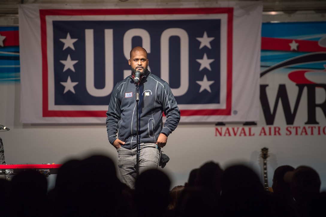 Sydney Castillo, comedian, entertains U.S. service members and their families during a USO show on Naval Air Station Sigonella, Italy, Dec. 5, 2015. DoD photo by D. Myles Cullen