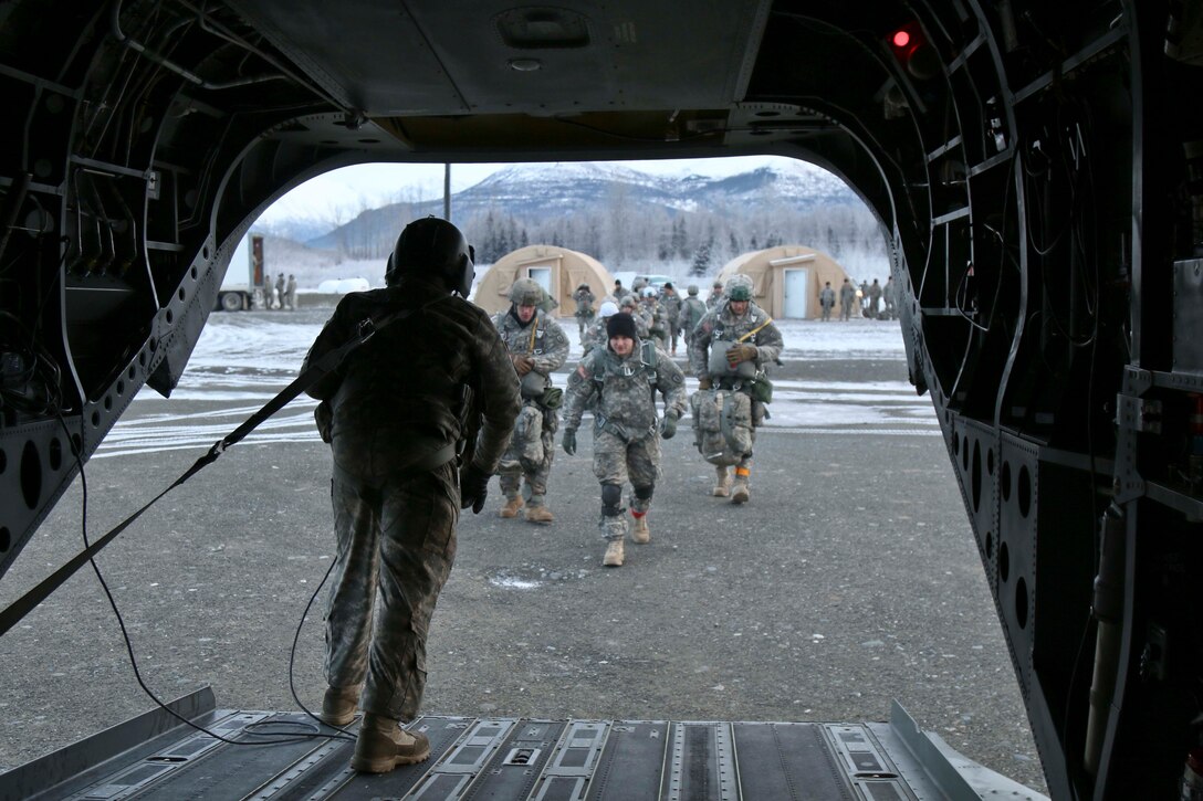 Paratroopers board a CH-47 Chinook helicopter on Joint Base Elmendorf-Richardson, Alaska, Dec. 3, 2015. U.S. Army photo by Staff Sgt. Brian Ragin