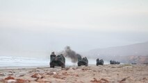 Amphibious assault vehicles proceed to assault their objective after conducting an amphibious landing during Exercise Steel Knight aboard Marine Corps Base Camp Pendleton, Calif., Dec. 4, 2015. The U.S. Navy and Marine Corps continue to combine efforts to revitalize, refine and strengthen fundamental amphibious capabilities, and reinforce the Navy and Marine Corps team. Steel Knight will test the Marine Air Ground-Task Force’s expeditionary capabilities through realistic, scenario-driven training. 