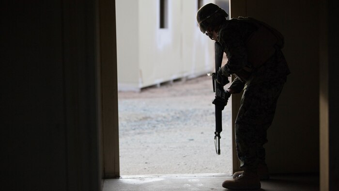 Marines from 1st Battalion, 1st Marine Regiment, clear a simulated combat town during Exercise Steel Knight aboard Marine Corps Base Camp Pendleton, Calif., Dec. 4, 2015. The U.S. Navy and Marine Corps continue to combine efforts to revitalize, refine and strengthen fundamental amphibious capabilities, and reinforce the Navy and Marine Corps team. Steel Knight will test the Marine Air Ground-Task Force’s expeditionary capabilities through realistic, scenario-driven training. 