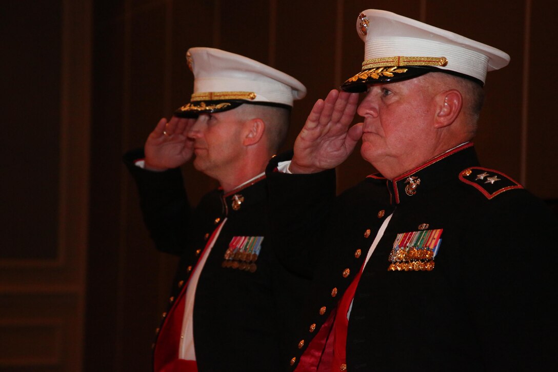 Col. Jeffrey C. Smitherman (left) and Maj. Gen. (Ret.)Charles M. Gurganus (right) salute as the Color Guard retires for the evening at the Marine Corp's 240th Birthday Ball Nov. 13, 2015 at the Westin Resort and Spa, Hilton Head Island, S.C. Every year Marines gather together to celebrate their proud traditions, history, and boost morale. Smitherman is the Commanding Officer of 6th Marine Corps District, Marine Corps Recruiting Command. (U.S. Marine Corps photo by Cpl. Diamond N. Peden/released)