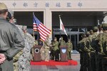 CAMP ITAMI, JAPAN  (Camp Itami, Japan, Dec. 5, 2015 )  - Lt. Gen. Stephen Lanza, left, I Corps commanding general, and Lt. Gen. Junji Suzuki, commander of the Japanese Ground Self-Defense Force Middle Army, shake hands to mark the beginning of Exercise Yama Sakura 69 during the opening ceremony at the Middle Army Headquarters.  