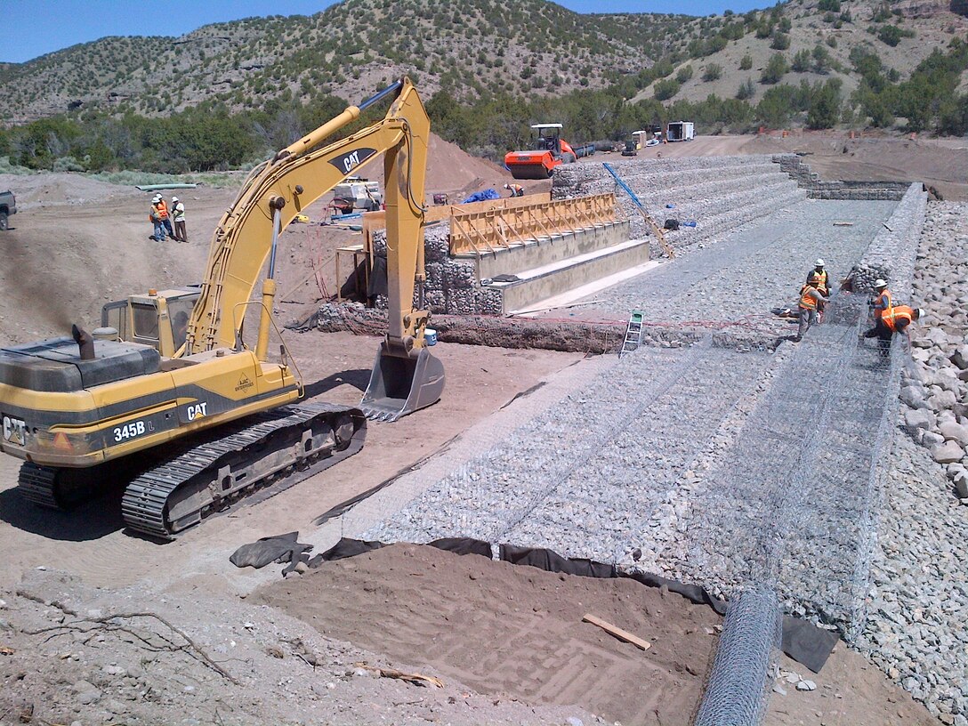 SANTA CLARA PUEBLO, N.M. – One of the check structures under construction in Santa Clara Canyon. The structure will help reduce the risk of flooding from rain falling on the Los Conchas burn scar in the canyon to the pueblo downstream. Photo by Jeff Daniels, June 2, 2015. This was a 2015 photo drive entry.