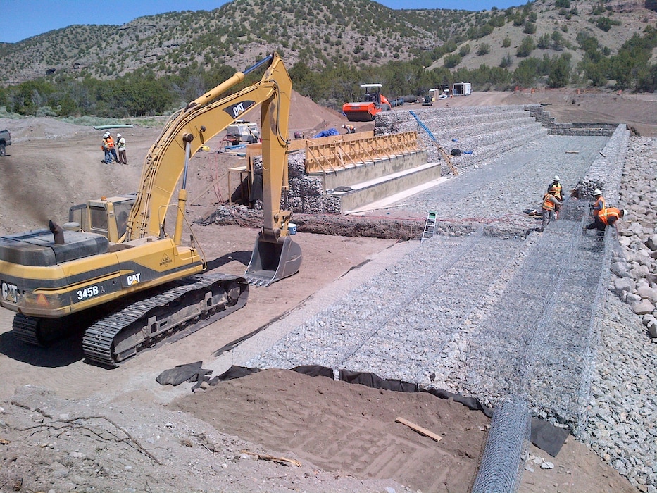 SANTA CLARA PUEBLO, N.M. – One of the check structures under construction in Santa Clara Canyon. The structure will help reduce the risk of flooding from rain falling on the Los Conchas burn scar in the canyon to the pueblo downstream. Photo by Jeff Daniels, June 2, 2015. 