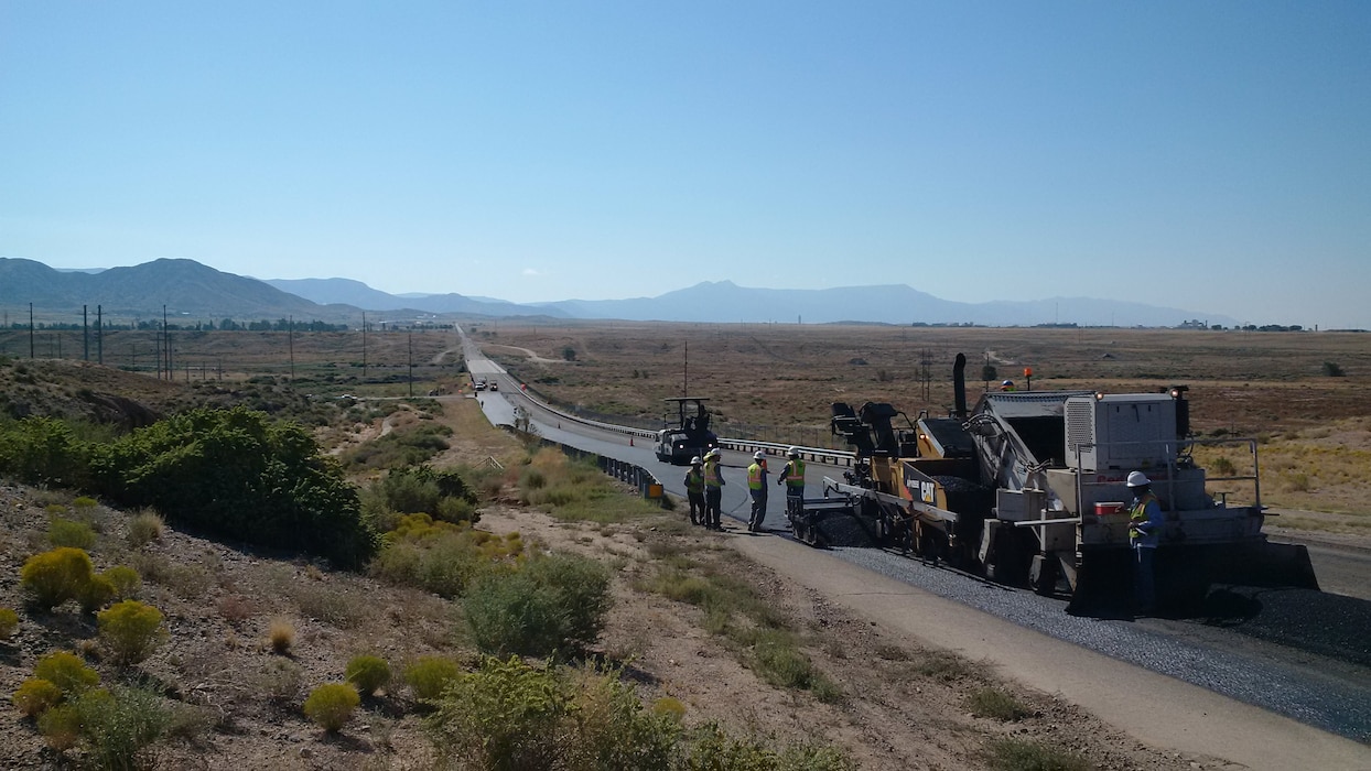 KIRTLAND AIR FORCE BASE, N.M. – A construction crew works on the asphalt of a base road. Photo by Nate Weander, Sept. 12, 2015.  