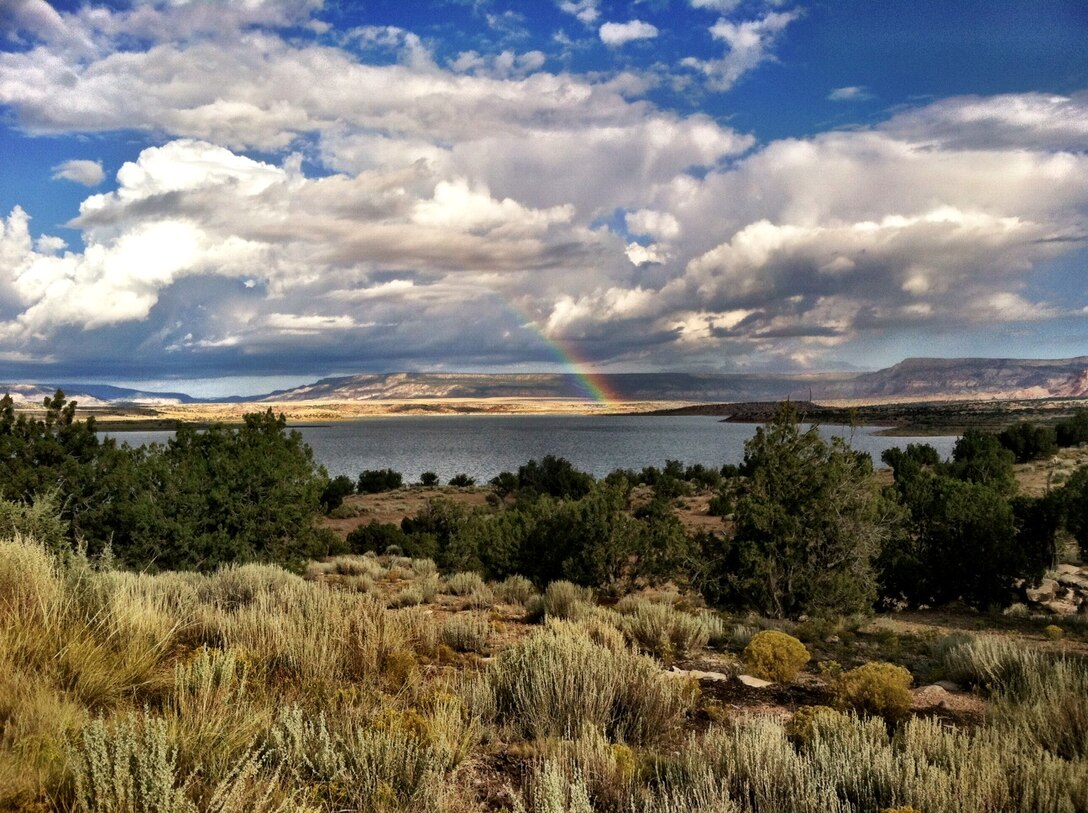 ABIQUIU LAKE, N.M. – The end of a rainbow is seen at Abiquiu Lake. The photo was taken from the Rianna Campground at the lake, Sept. 15, 2015. Photo by Austin Kuhlman. This was a 2015 photo drive entry.