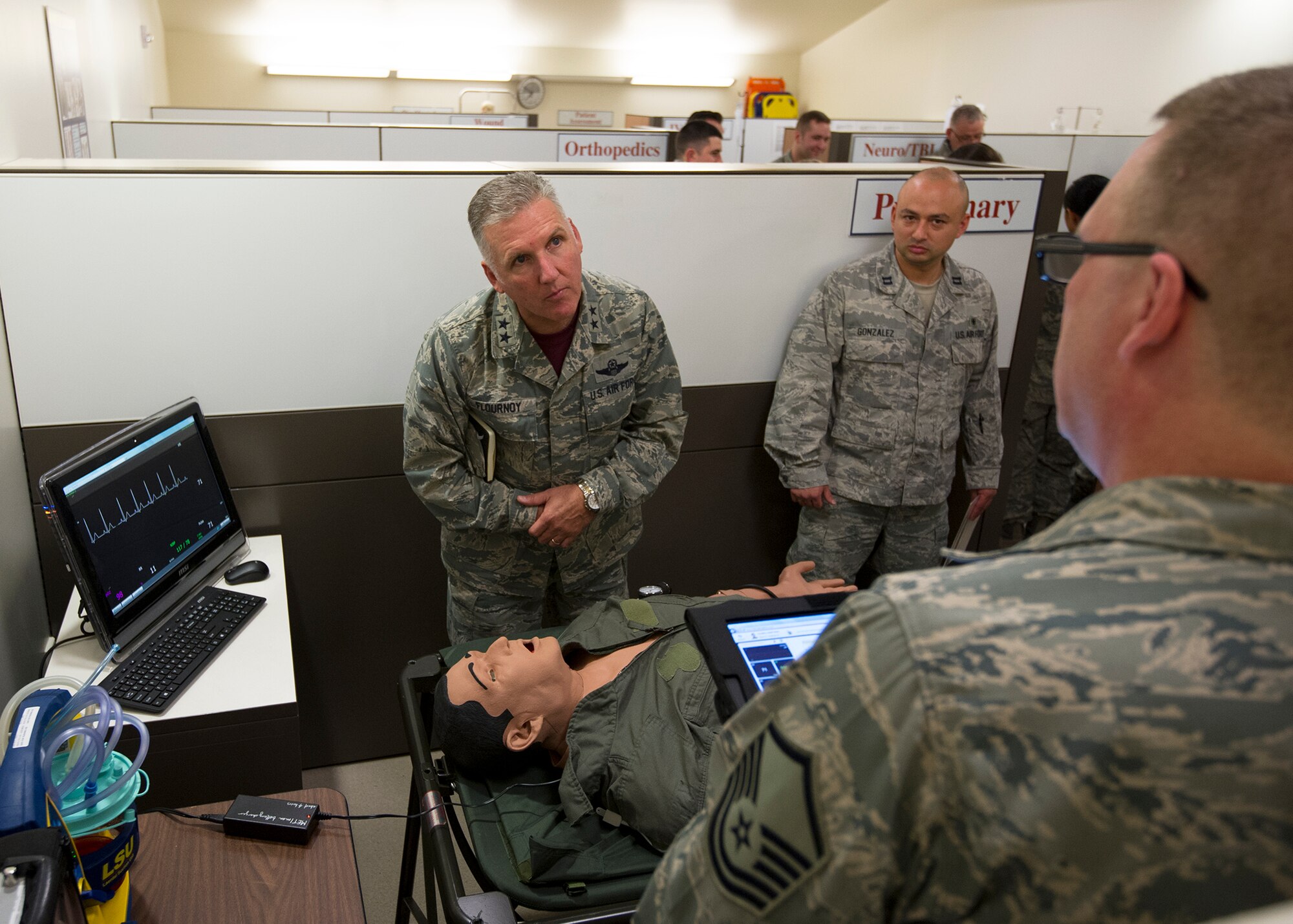 Maj. Gen. John C. Flournoy, Jr., 4th Air Force commander, talks with McChord Airmen during his visit to Joint Base Lewis-McChord, Wash., Nov. 8, 2015. Flournoy met with Reservists to identify opportunities and challenges that affect wing mission readiness.