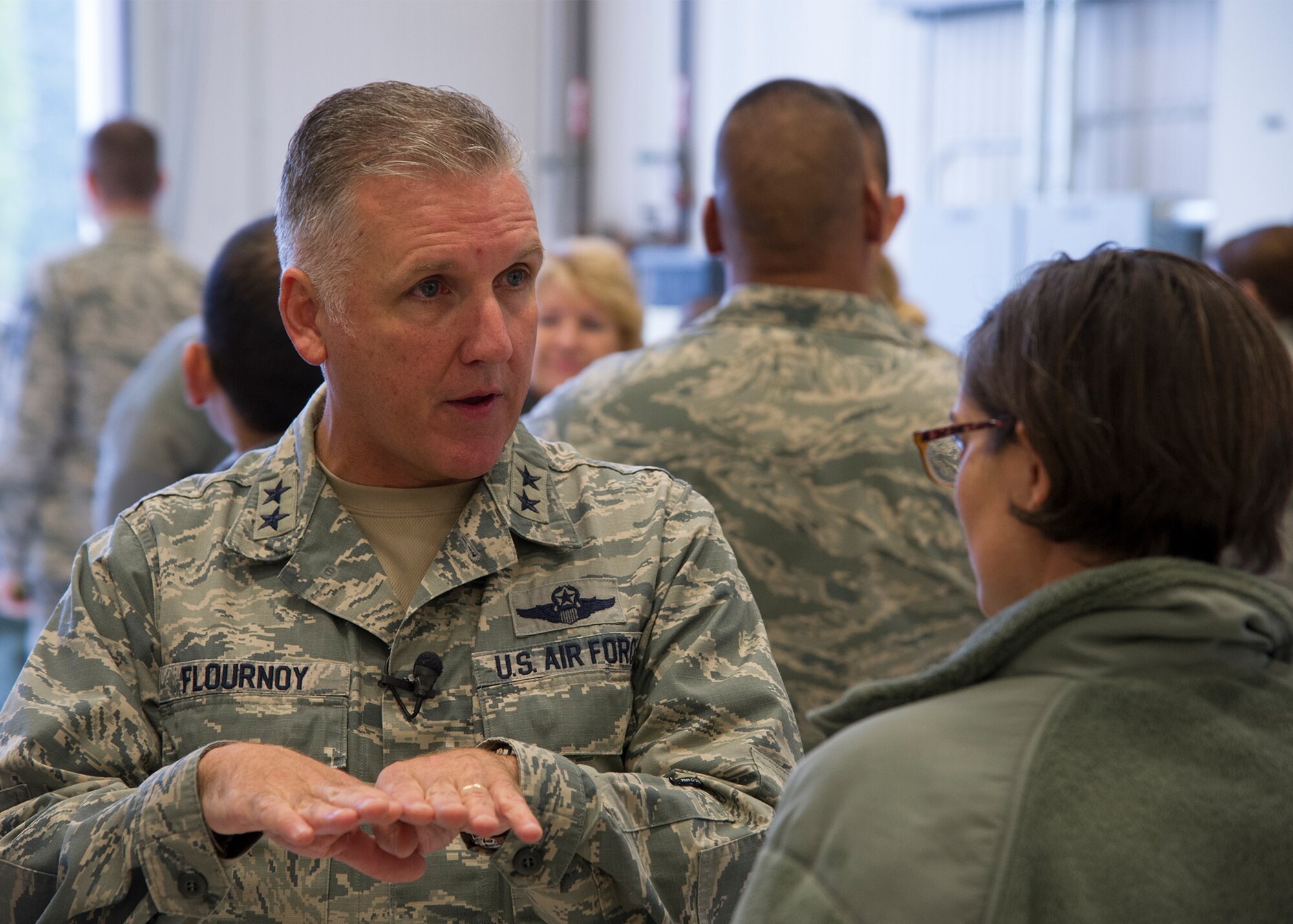Maj. Gen. John C. Flournoy, Jr., 4th Air Force commander, out of March Air Reserve Base, California, talks with McChord Airmen from the 446th Airlift Wing during his visit to Joint Base Lewis-McChord, Wash., Nov. 8, 2015. Flournoy met with his Reservists to identify opportunities and challenges that affect mission readiness.