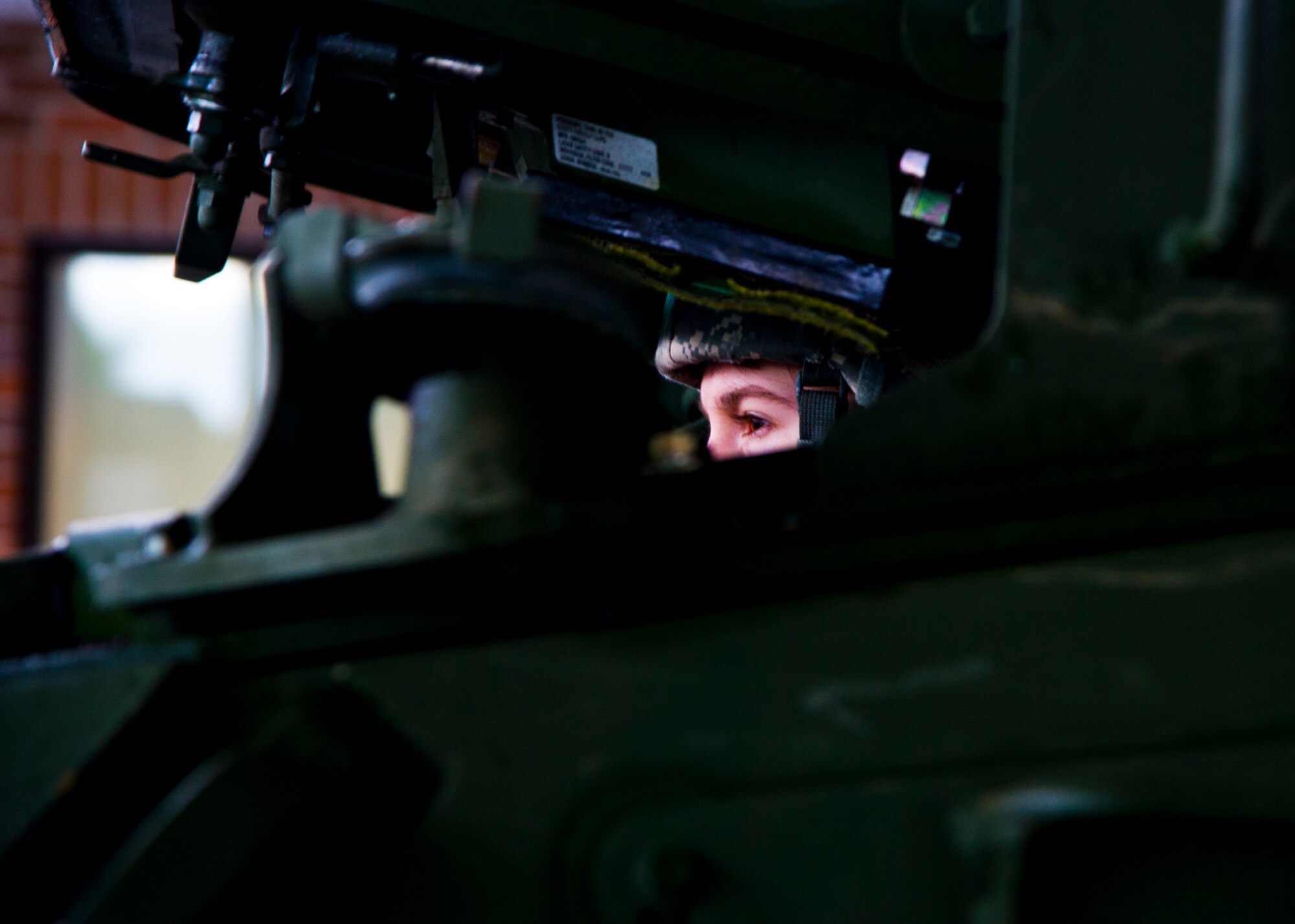 Army Spc. Amanda Ballentine, 301st Maneuver Enhancement Brigade, reverses a M1136 Stryker combat vehicle for measurements and weighing at Joint Base Lewis-McChord, Dec. 6. The 36th APS out of McChord Field helped to train the U.S. Army’s 301st Maneuver Enhancement Brigade on preparing a Stryker for transport in a C-17 Globemaster III.