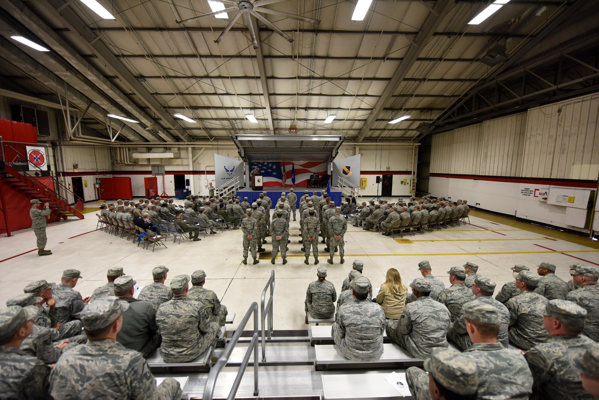 Attendees observe the 414th Maintenance Squadron assumption of command ceremony, Dec. 5, 2015, at Seymour Johnson Air Force Base, North Carolina. The 414th MXS, a reserve unit, supports the 4th Maintenance Group through total force integration. (U.S. Air Force photo/Senior Airman Aaron J. Jenne)