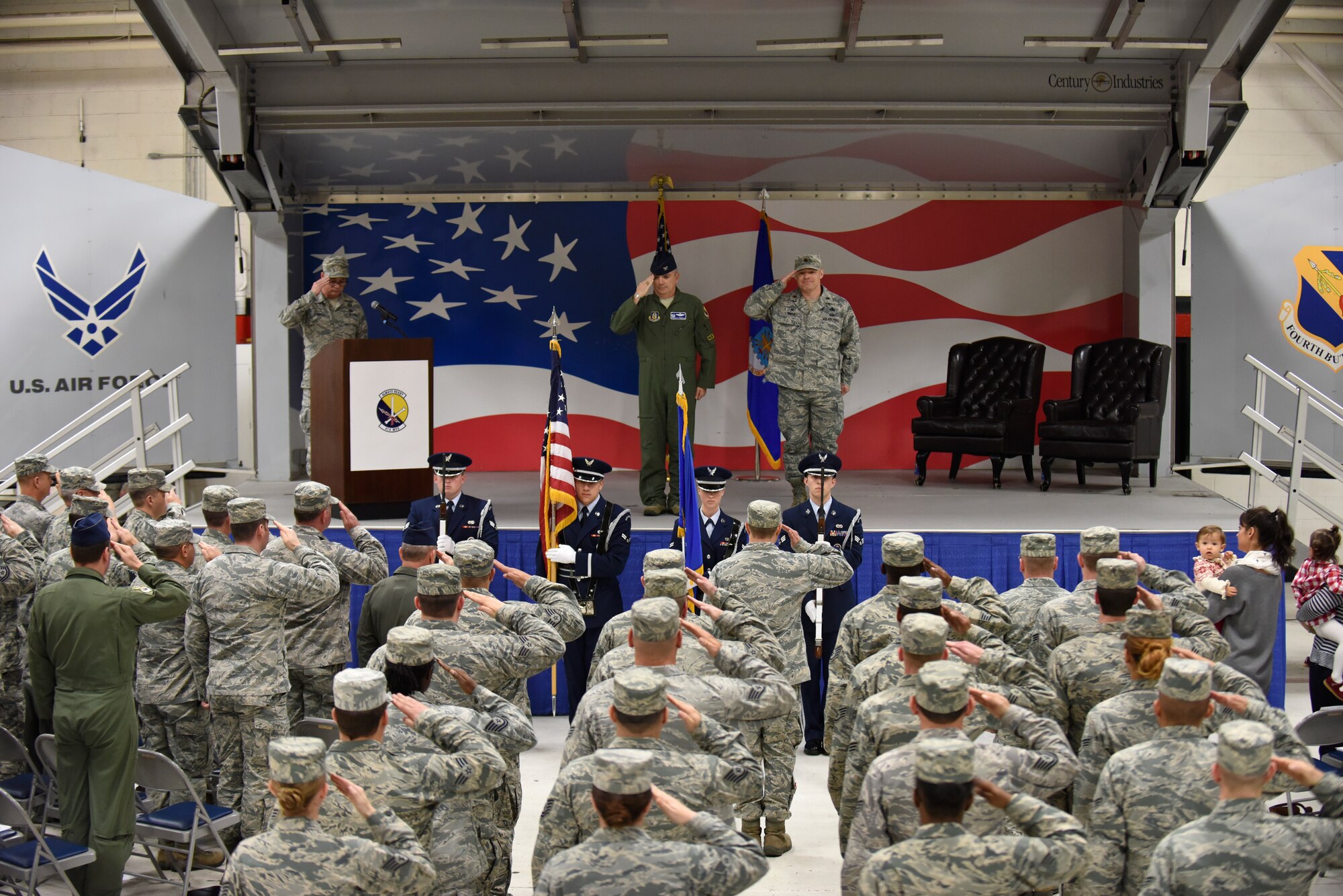 Members of the 4th Fighter Wing and 414th Fighter Group salute during the playing of the National Anthem, Dec. 5, 2015, at Seymour Johnson Air Force Base, North Carolina. The 414th Maintenance Squadron supports the 4th Maintenance Group in maintaining F-15E Strike Eagles assigned to the 4th FW. (U.S. Air Force photo/Senior Airman Aaron J. Jenne)