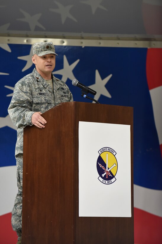 Maj. Paul Smith, 414th Maintenance Squadron incoming commander, addresses Airmen in attendance during the 414th MXS assumption of command, Dec. 5, 2015, at Seymour Johnson Air Force Base, North Carolina. Smith previously served as the 916th Maintenance Squadron commander. (U.S. Air Force photo/Senior Airman Aaron J. Jenne)