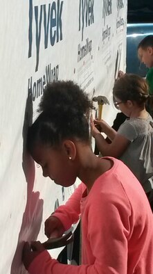 Mountain Home School District Gifted and Talented middle school students hammer siding to their tiny house project in September 2015. The project gives children an opportunity for higher level thinking and problem solving. GT is an enrichment program that offers creative art, writing, building, and a competitive Mars Rover team to students from two to two and a half hours a week. With the exception of the Mars team, which serves 5th and 6th graders, the creative classes are K to 6. To qualify, a student must go through referral and testing procedures. For more information visit http://www.mtnhomesd.org/gifted--talented-program.html (Courtesy photo by Mountain Home School District)
