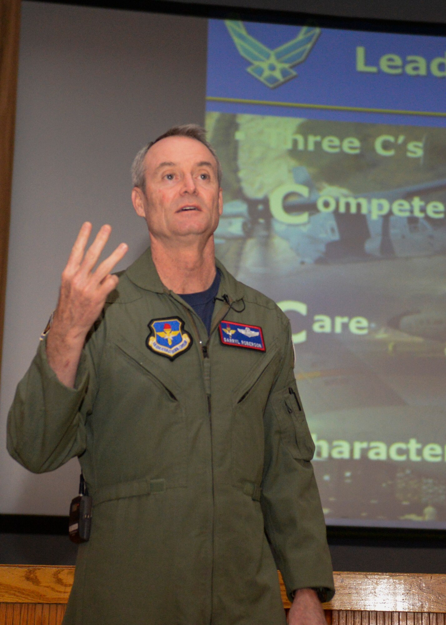 The commander of Air and Education Training Command, Lt. Gen. Darryl Roberson, holds an All Call at the base theater at Holloman Air Force Base, New Mexico on Dec. 4. Roberson spoke about the three C’s of leadership, as well as opening up more special duty positions. During his visit to Holloman, Roberson also met and coined five superior performers from the 54th Fighter Group. (U.S. Air Force photo by Staff Sgt. E’Lysia A. Wray)