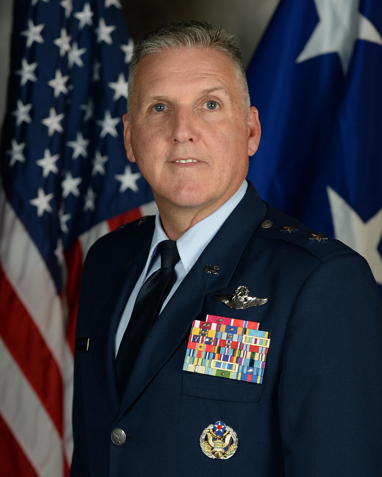 Maj. Gen. John Flournoy, 4th Air Force commander, addressed the 434th Air Refueling Wing Airmen in a video thanking them for their hard work and dedication to the mission during the 434th ARW Commander's Call at Grissom Air Reserve Base, Ind., Dec. 6, 2015. The accomplishments mentioned were Grissom's flying hours, Nuclear Operational Readiness Inspection, Cyber Command Readiness Inspection, deployments, recycling/energy conservation and Grissom's fire training facility. (U.S. Air Force photo/ Staff Sgt. Michael Quiboloy)