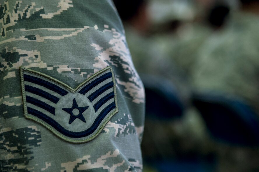 A U.S. Air Force Staff Sgt. listens to U.S. Air Force Gen. Frank Gorenc, U.S. Air Forces in Europe and Air Forces Africa commander, during his all call inside Hangar 1 at Spangdahlem Air Base, Germany, Dec. 3, 2015. The general spoke about current events and answered questions from Airmen during the event. (U.S. Air Force photo by Senior Airman Rusty Frank/Released)