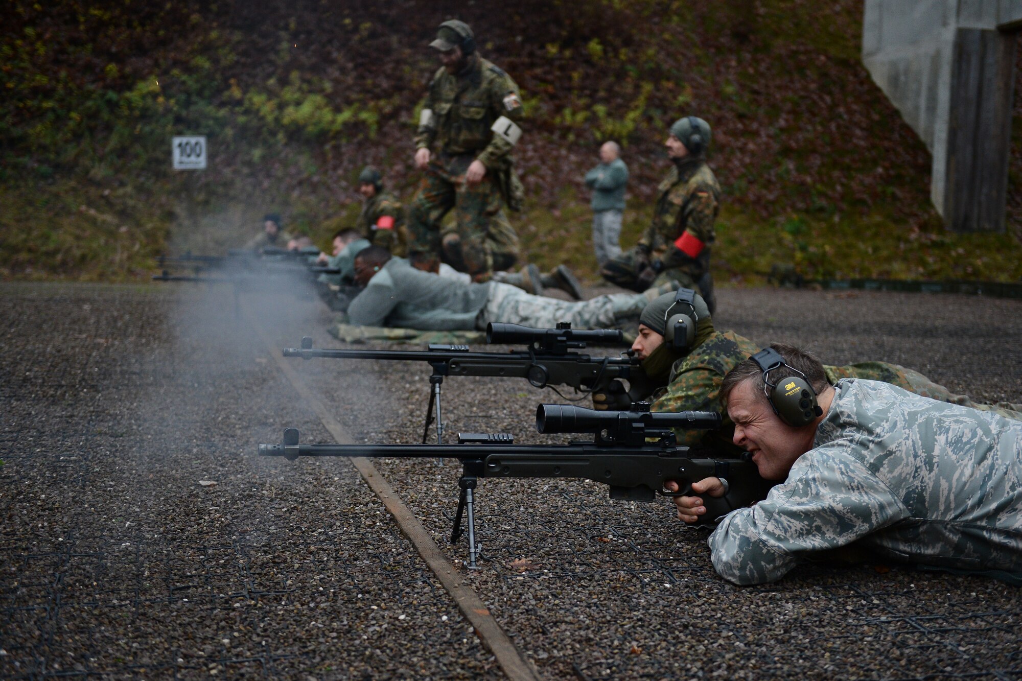 U.S. Air Force Gen. Frank Gorenc, U.S. Air Forces in Europe and Air Forces Africa commander, fires a sniper rifle during target practice at the 702nd Munitions Support Squadron at Buechel Air Base, Germany, Dec. 3, 2015. The 702nd MUNSS is a geographically separated unit responsible for receipt, storage, maintenance and control of US war reserve munitions in support of the German air force 33rd Fighter-Bomber Wing. (U.S. Air Force photo by Airman 1st Class Luke Kitterman)