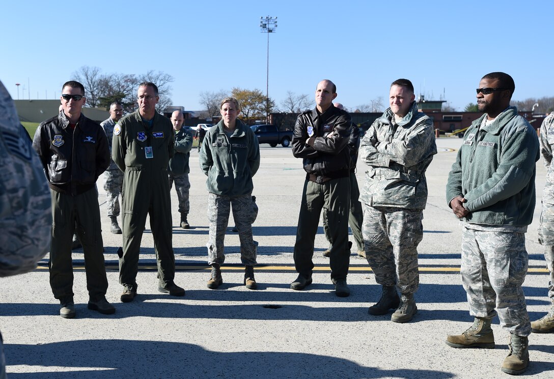 Joint Base Andrews commanders listen to a snow removal operations brief during the 11th Civil Engineer Squadron’s Snow Parade at Joint Base Andrews, Md., Dec. 4, 2015. The parade was held to recognize some of the key mission-essential workers during the snow removal season. (U.S. Air Force photo/ Senior Airman Nesha Humes/ released)