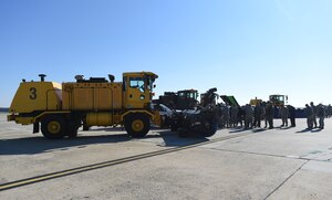 The 11th Civil Engineer Squadron hosted a Snow Parade in order to recognize vital snow preparation efforts in support of the presidential and alert missions at Joint Base Andrews, Md., Dec. 4, 2015. (U.S. Air Force photo/ Senior Airman Nesha Humes/ released)