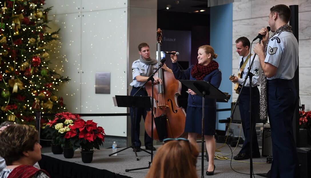 The Singing Sergeants perform during the Smithsonian Holiday Festival at the National Museum of American History, Dec. 5, 2015, in Washington, D.C. The group is one of six musical ensembles that comprise the U.S. Air Force Band, and performed for an audience of approximately 2,000 people. (U.S. Air Force photo by Senior Airman Mariah Haddenham/ Released)