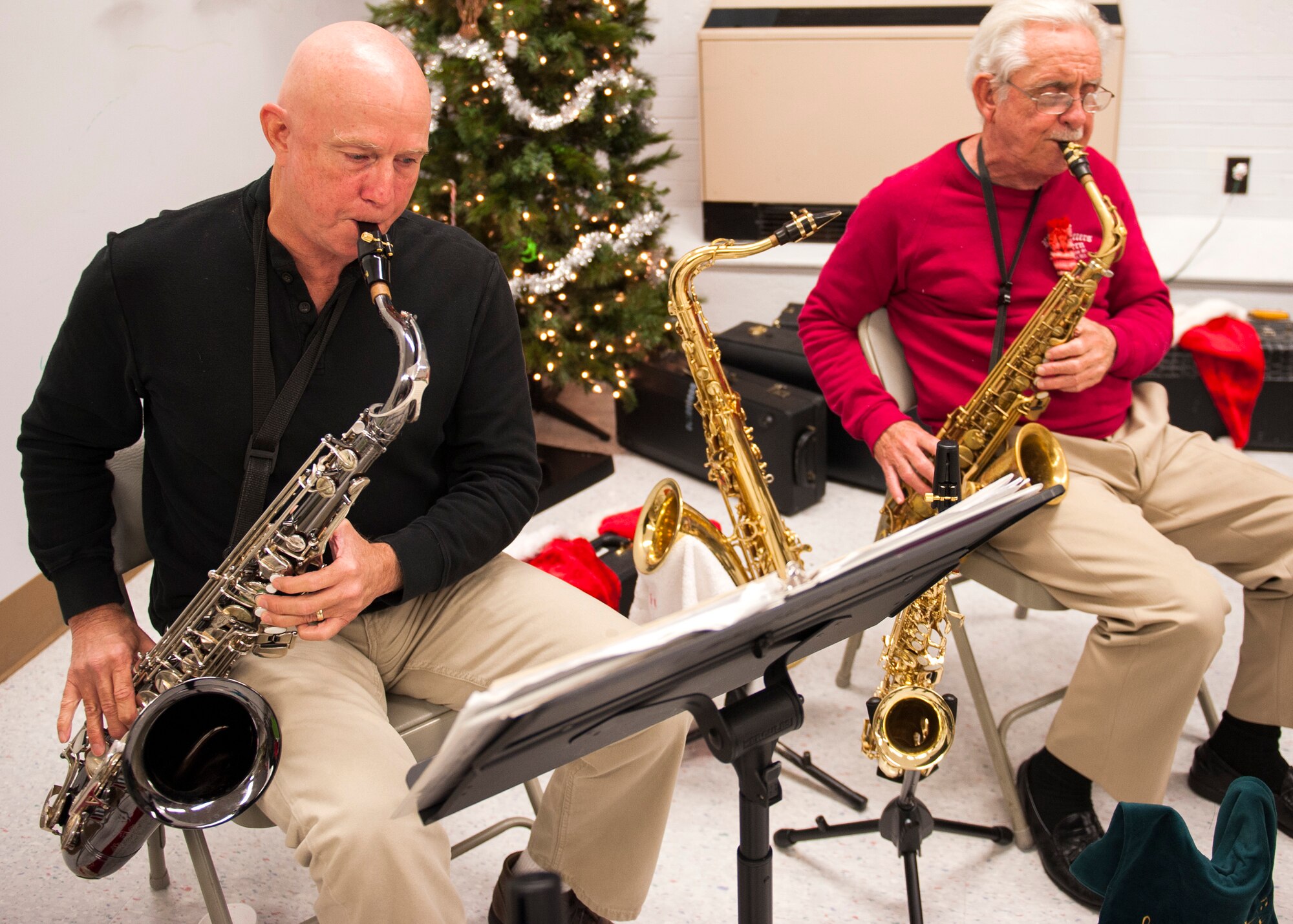 Saxsation plays Christmas music during the base’s Christmas tree lighting festivities Dec. 4 at Eglin Air Force Base, Fla. The Eglin community came out for the tree lighting, the announcement of the base Christmas card contest winners, and the Chapel’s reception. (U.S. Air Force photo/Ilka Cole)