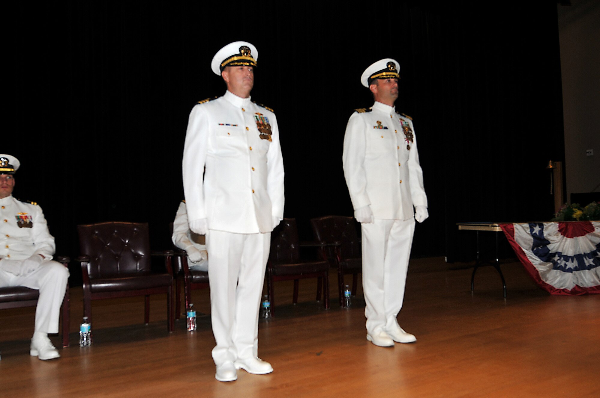 Cmdr. David Wilhite (left) relieves Cmdr. Marc F. Williams during the Naval Mobile Construction Battalion 14 change of command ceremony on board Naval Construction Battalion Center Gulfport, Miss., Nov. 5. (U.S. Navy photo/Senior Chief Mass Communication Specialist Jeffrey J. Pierce)