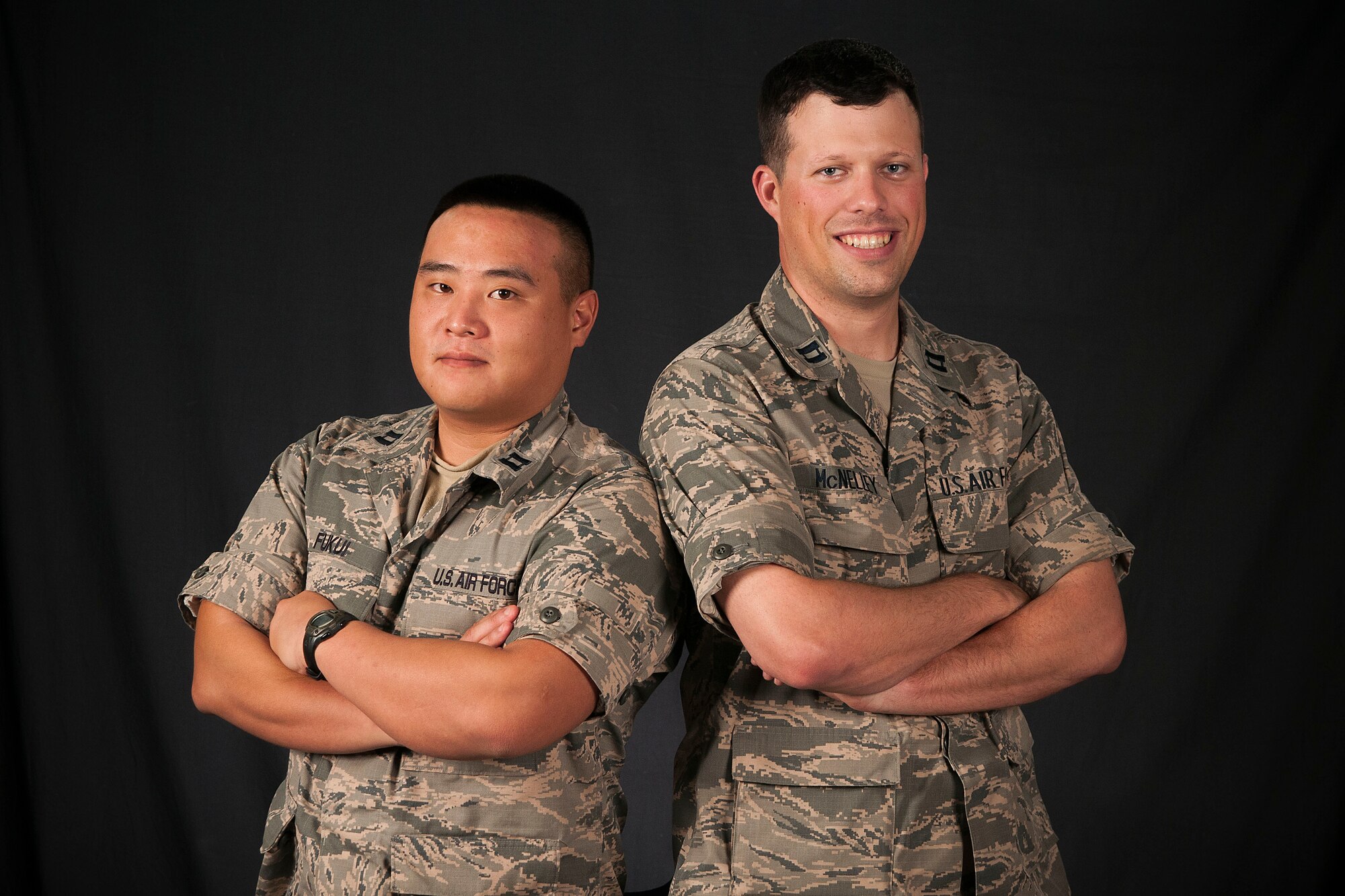 Christopher Fukui and Joshua McNelley are U.S. Air Force captains from the 18th Logistics Readiness Squadron at Kadena Air Base, Japan. Both Airmen are descendants of Sailors who fought in the Battle of Midway in World War II. Fukui’s great-grandfather, Chisato Morita, commanded the Imperial Japanese Navy Midway Flying Corps aboard the aircraft carrier Akagi and McNelley’s grandfather, Ray Sorton, a U.S. Navy Sailor, manned an anti-aircraft gun during the battle. (U.S. Air Force photo by Senior Airman John Linzmeier) 