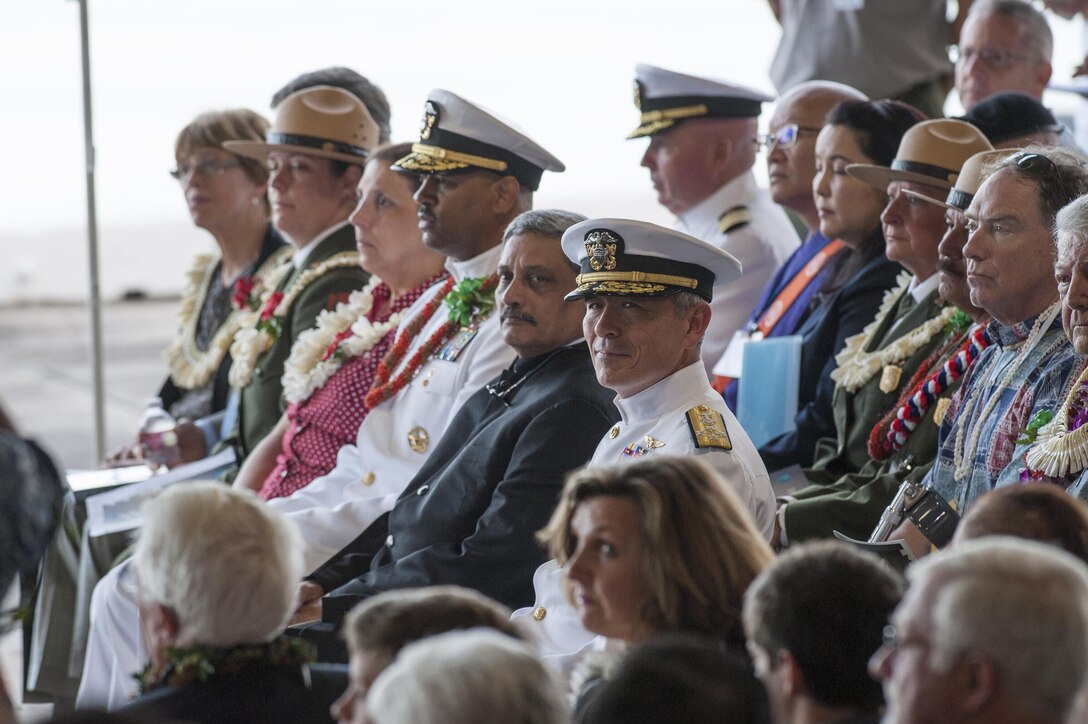 Navy Adm. Harry Harris, center, commander of U.S. Pacific Command, attends the Pearl Harbor Day Commemoration Anniversary at Joint Base Pearl Harbor-Hickam, Hawaii, Dec. 7, 2015. U.S. Air Force photo by Staff Sgt. Christopher Hubenthal
