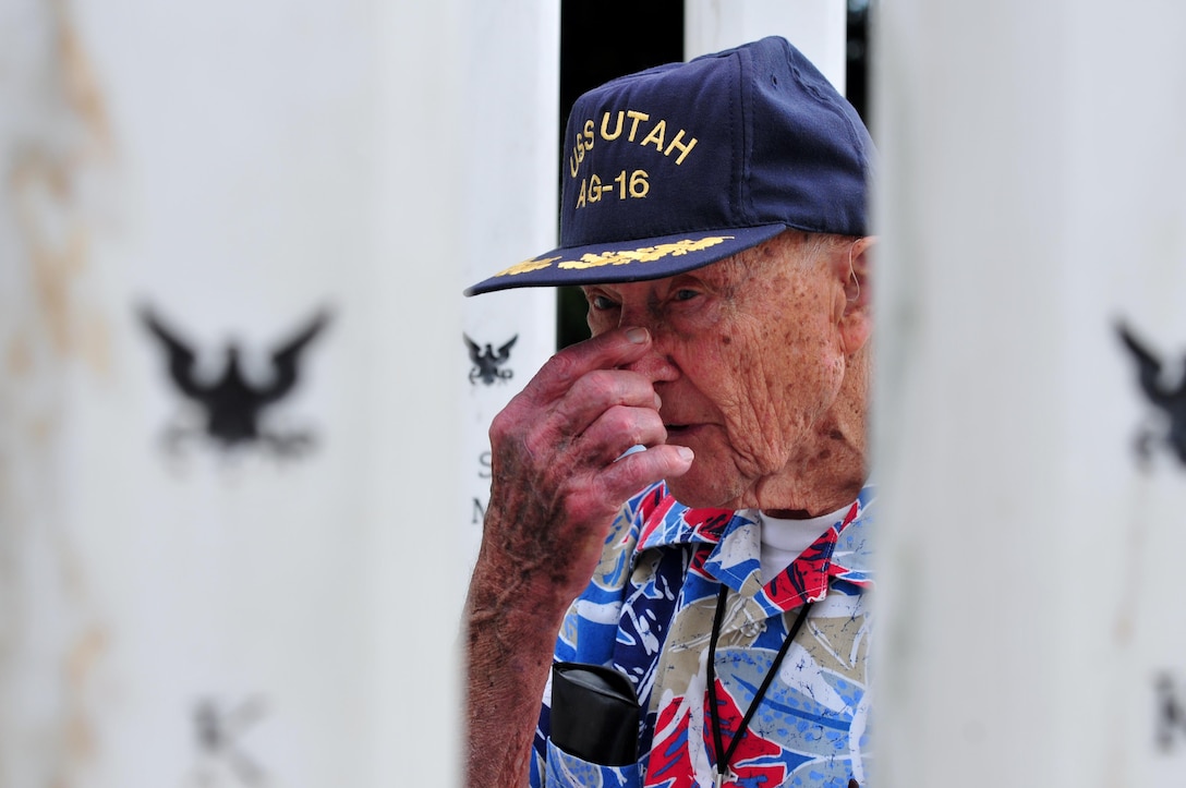 A Pearl Harbor survivor reflects following a ceremony at the USS Oklahoma Memorial during a Pearl Harbor Day Commemoration Anniversary at Joint Base Pearl Harbor-Hickam, Hawaii, Dec. 7, 2015. U.S. Navy photo by Petty Officer 1st Class Rebecca Wolfbrandt