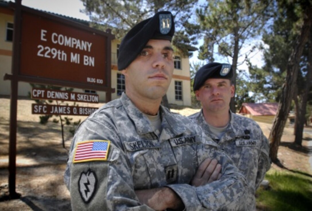 Prior to returning to command the 2nd Stryker Cavalry Regiment in Afghanistan, then-Army Capt. D.J. Skelton, left, is pictured with his first sergeant, Sgt. 1st Class James O. Bishop while in command of Company E, 229th Military Intelligence Battalion. In Iraq in 2004, Skelton sustained grave injuries, and he fought for several years to stay on active duty and return to command in combat. Courtesy photo