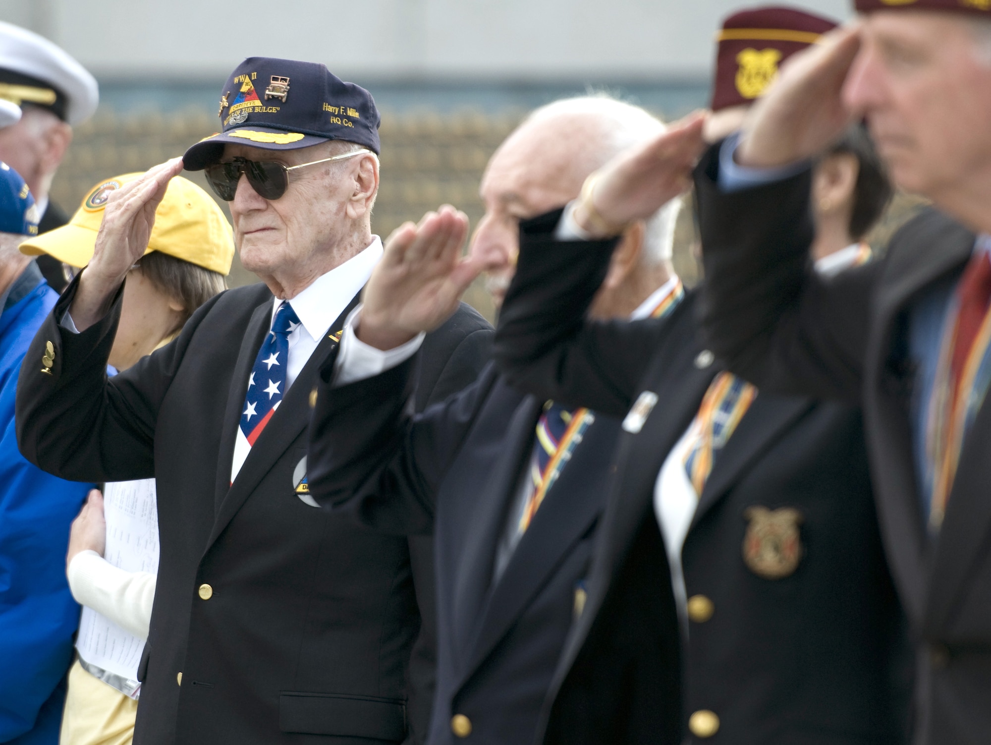 Veterans render a salute after laying wreaths during a Pearl Harbor remembrance ceremony at the National World War II Memorial on Dec. 7, 2015, in Washington, D.C. (U.S. Air Force photo/Sean Kimmons)