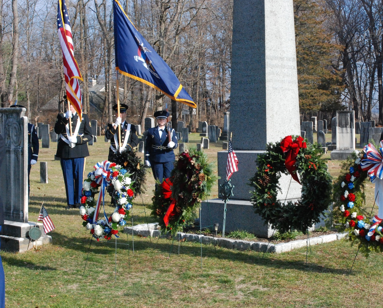 A wreath from President Barack Obama takes pride of place among a number of wreaths placed at the gravesite of President Martin Van Buren at the Dutch Reformed Cemetery in Kinderhook, New York, during a ceremony honoring the eighth president on Dec. 5, 2015, the 233rd anniversary of his birth. 