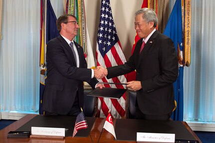 WASHINGTON (Dec. 7, 2015) - U.S. Defense Secretary Ash Carter and Singaporean Defense Minister Ng Eng Hen shake hands after signing the Enhanced Defense Cooperation Agreement during a meeting at the Pentagon, Dec. 7, 2015. 