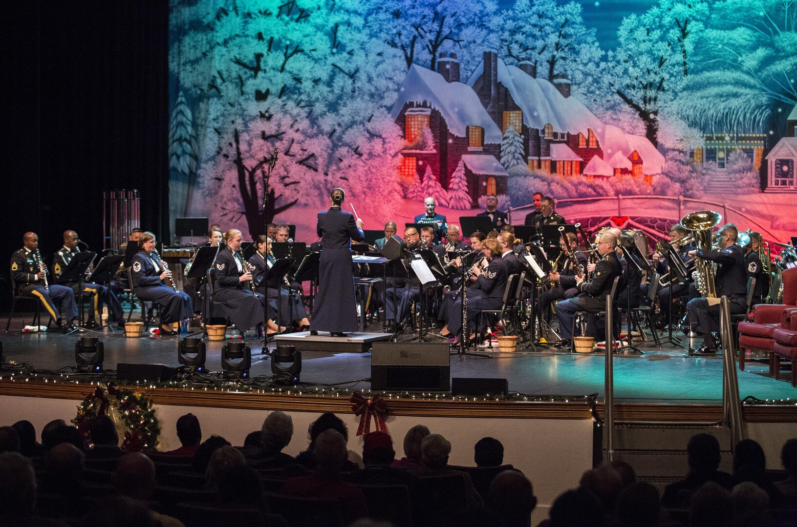 United States Air Force Band of the West performs during the Holiday in Blue concert Dec. 7, 2015 at the Edgewood Independent School District Theatre for the Performing Arts in San Antonio, Texas. The concert included a variety of holiday songs from around the world, a children’s story and a sing-a-long. Attendees included members of JBSA, community members and retirees. The Airmen assigned to the band are highly-trained professional musicians who have dedicated themselves to serving their country through music. (U.S. Air Force photo by Johnny Saldivar)