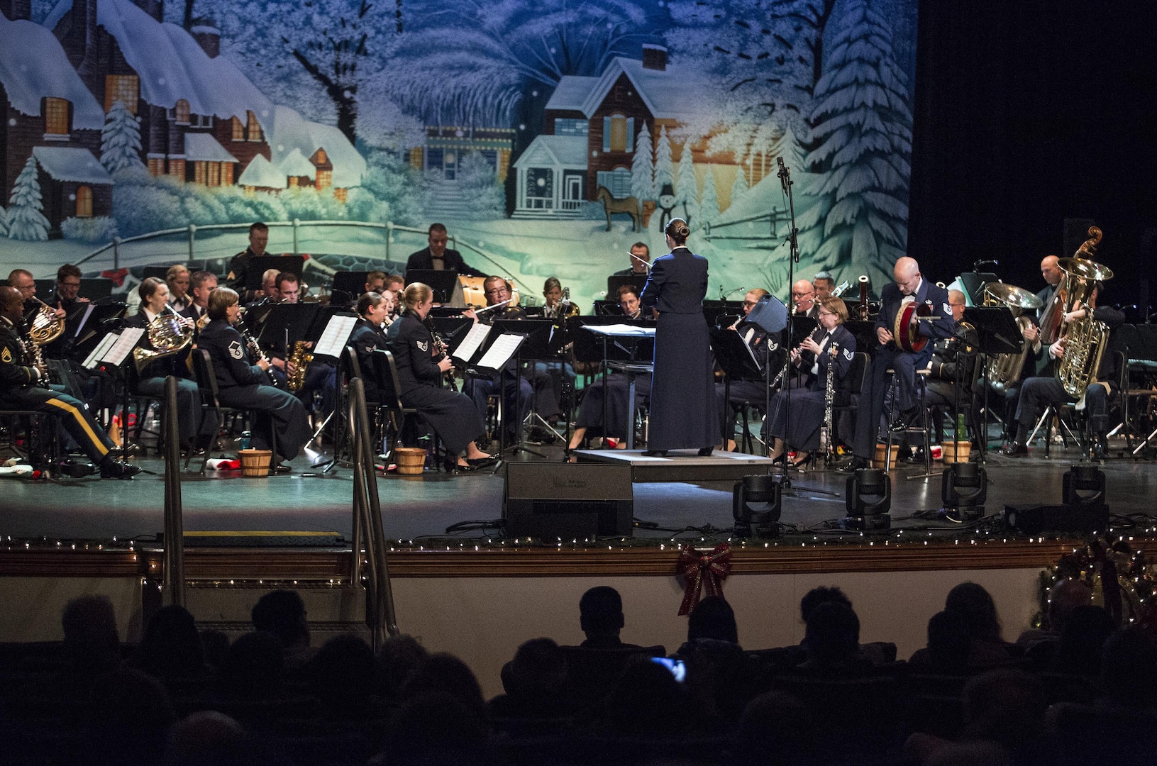 United States Air Force Band of the West performs during the Holiday in Blue concert Dec. 7, 2015 at the Edgewood Independent School District Theatre for the Performing Arts in San Antonio, Texas. The concert included a variety of holiday songs from around the world, a children’s story and a sing-a-long. Attendees included members of JBSA, community members and retirees. The Airmen assigned to the band are highly-trained professional musicians who have dedicated themselves to serving their country through music. (U.S. Air Force photo by Johnny Saldivar)