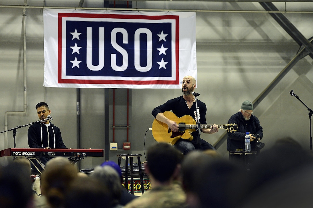 Chris Daughtry sings to troops during the USO Tour on Bagram Airfield, Afghanistan, Dec. 8, 2015. U.S. Air Force photo by Staff Sgt. Tony Coronado