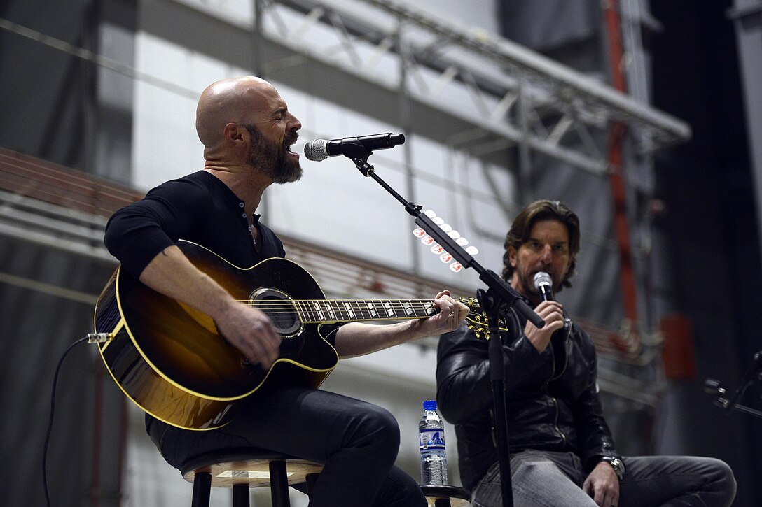 Recording artist Chris Daughtry sings to troops during the USO Tour on Bagram Airfield, Afghanistan, Dec. 8, 2015. U.S. Air Force photo by Staff Sgt. Tony Coronado