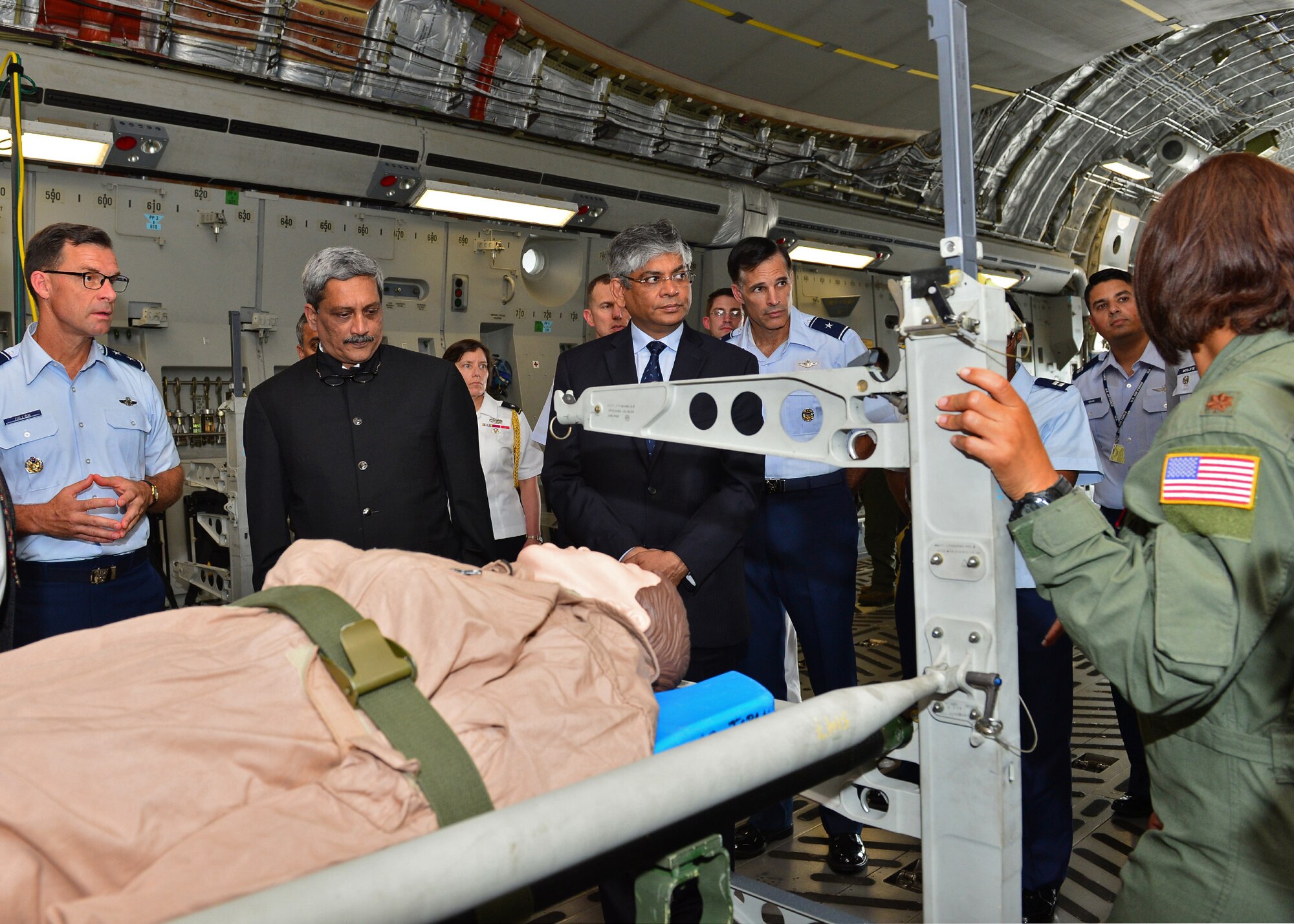 PACAF Airmen demonstrate the aeromedical evacuation capabilities of the C-17 Globemaster III to Manohar Parrikar, the India Defense Minister (left), and Arun K. Singh, the Indian Ambassador to the U.S., on Joint Base Pearl Harbor-Hickam, Hawaii, Dec. 7, 2015. The Indian air force has the world's 2nd largest fleet of C-17s, behind the U.S., and these aircraft have already proven their value in supporting international response to regional crises. (U.S. Air Force photo by Tech. Sgt. Aaron Oelrich/Released)