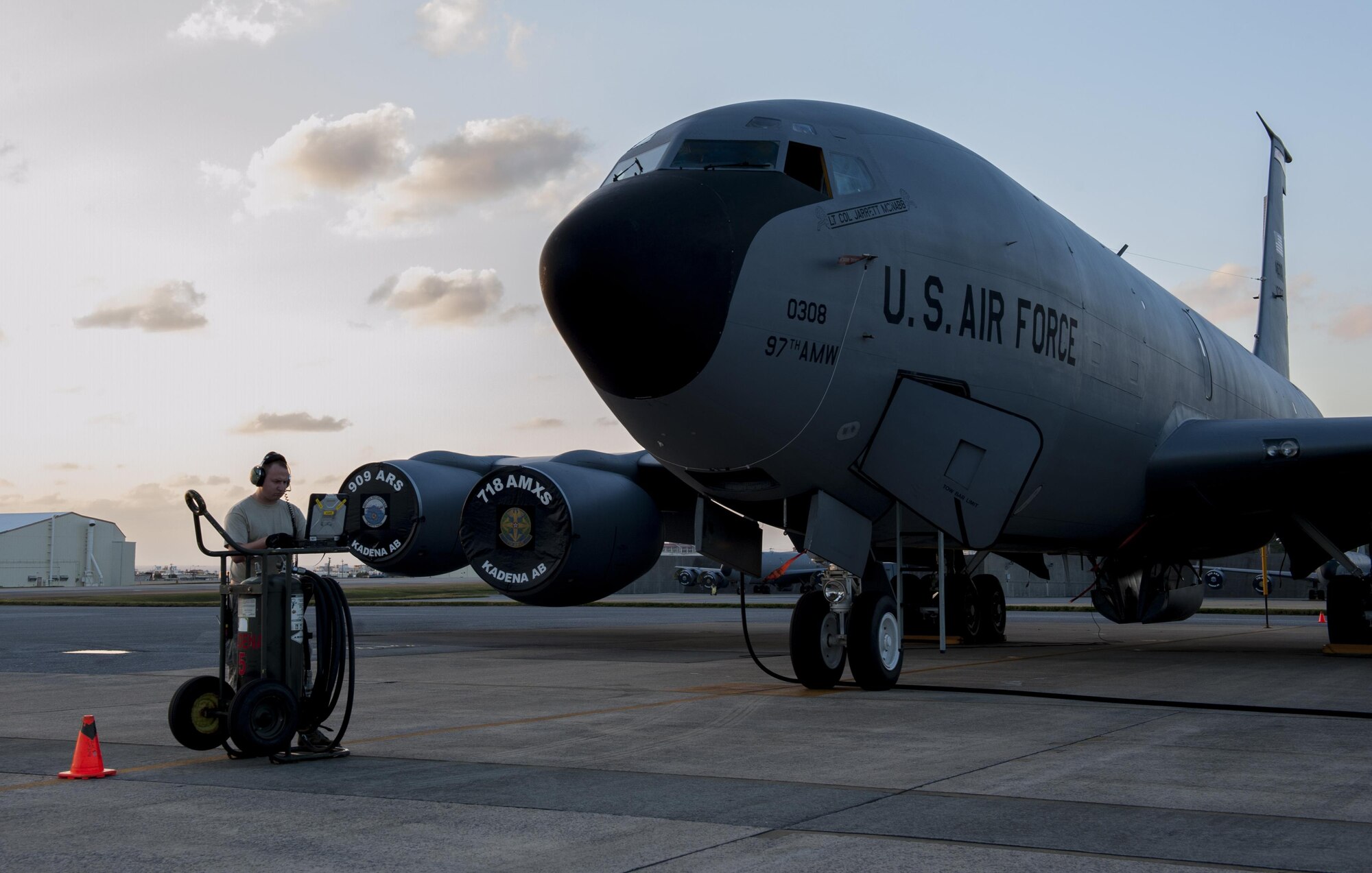 U.S. Air Force Staff Sgt. Chirstopher Anderson, 909th Aircraft Maintenance Unit crew chief, reviews his technical orders during a routine ground refueling Dec. 7, 2015, on Kadena Air Base, Japan. Techincal orders are guides for repairing, maintaining and performing daily duties for maintainers to ensure consistent aircraft care throughout the Air Force. (U.S. Air Force photo by Airman Zackary A. Henry)