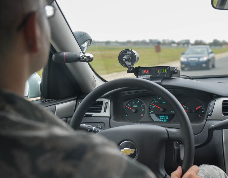 Tech. Sgt. David Krick, 2nd Security Forces Squadron training instructor, utilizes new moving radar technology designed to register motorist’s speeds while on vehicle patrol at Barksdale Air Force Base, La., Dec. 1, 2015. The new system is designed to detect vehicle speeds on both lanes of traffic to provide patrol vehicles with the same speed enforcement capabilities as stationary radar units. (U.S. Air Force photo/Airman 1st Class Mozer O. Da Cunha)