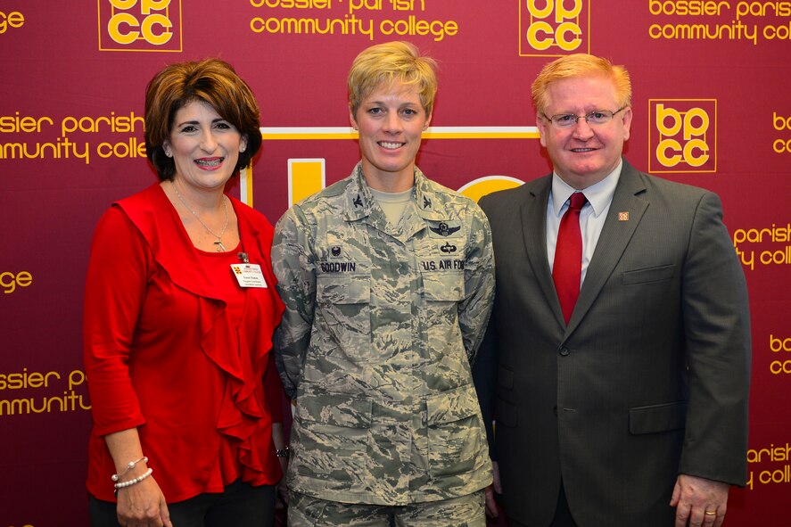 Col. Kristin Goodwin, 2nd Bomb Wing commander, and Rick Bateman Jr., Bossier Parish Community College chancellor, sign a proclamation giving Airmen and their families a chance to attend sports and performing arts events free of charge at BPCC, Dec. 4, 2015. During the signing, Goodwin spoke to BPCC students about the 2nd Bomb Wing's priorities of people, mission and pride, and how they align with BPCC's goal of empowering students and Airmen.