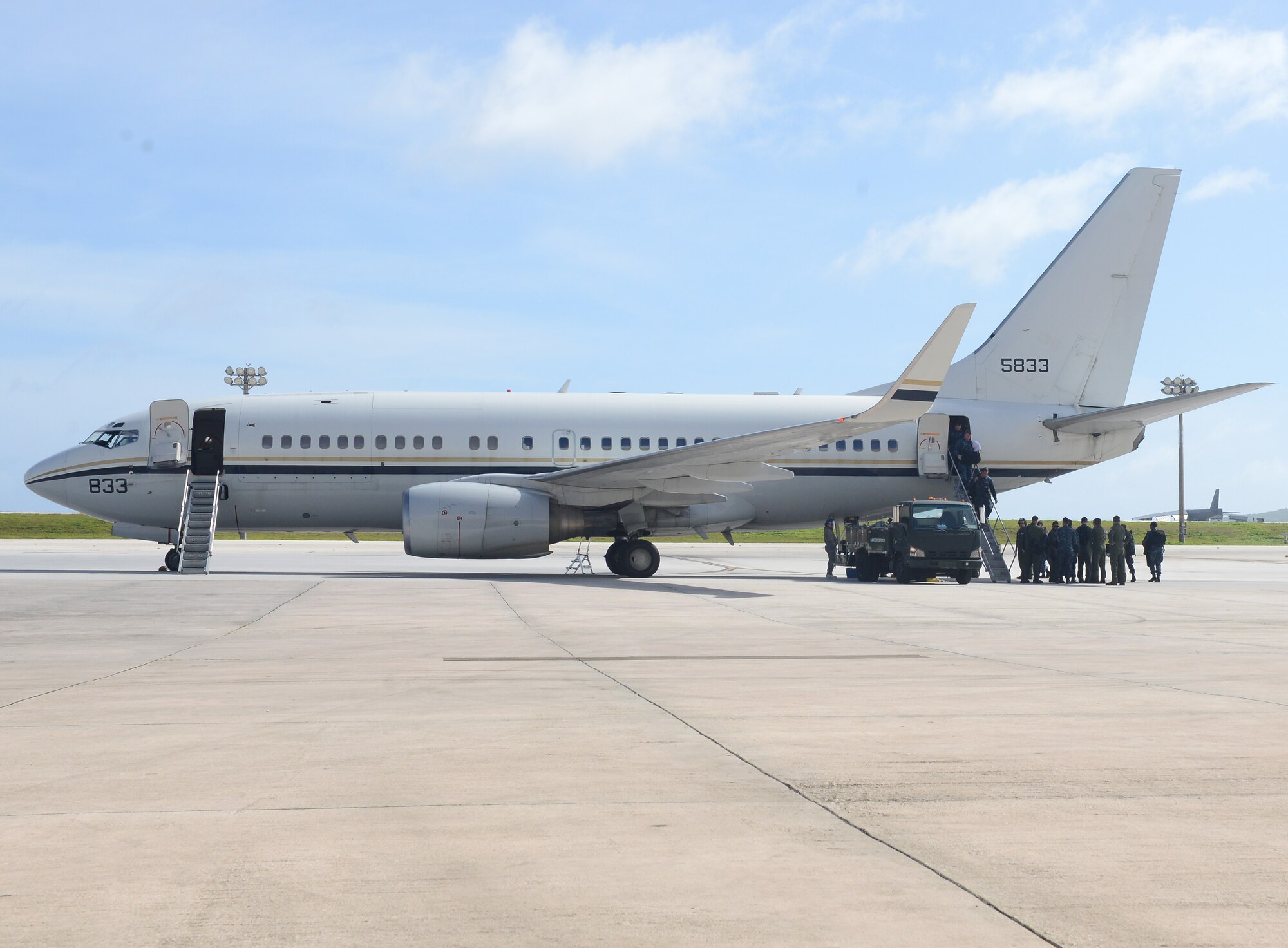 The U.S. Navy’s Helicopter Sea Combat Squadron 25 welcomes Detachment 6 Sailors home Dec. 7, 2015, at Andersen Air Force Base, Guam. The Sailors supported a Combat Logistics Force mission from the USNS Washington Chambers in support of Commander Task Force 73. (U.S. Air Force photo by Airman 1st Class Arielle Vasquez/Released)