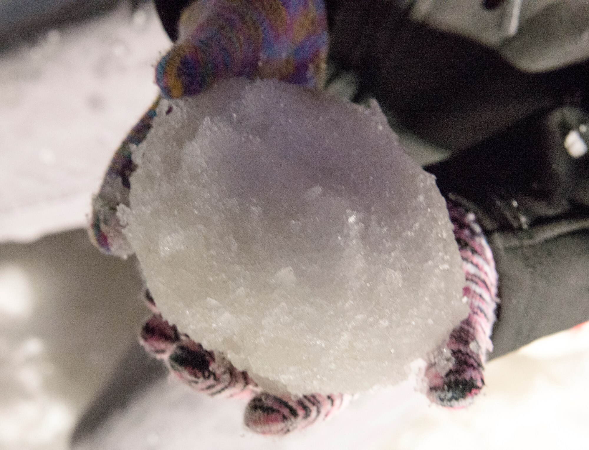 Children make snowballs at the annual tree lighting ceremony, Dec. 4, 2015, at Moody Air Force Base, Ga. Moody imported more than 100,000 pounds of snow for the children to play in during the ceremony. (U.S. Air Force photo by Airman 1st Class Lauren M. Johnson/Released)
