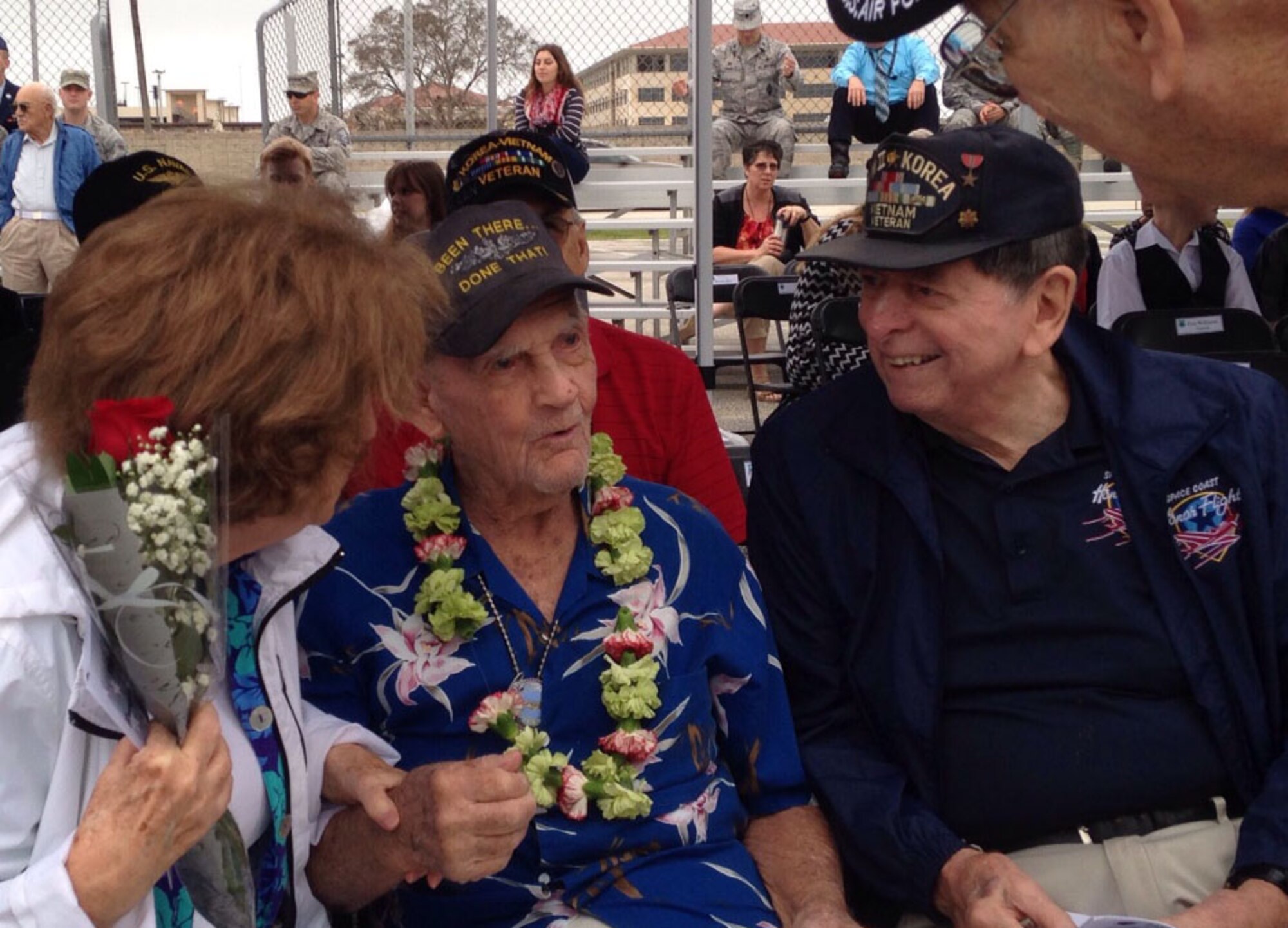 George Herold (center) a Pearl Harbor survivor, speaks with other veterans during the 20th Annual Pearl Harbor and Pacific Theater Veterans Ceremony Dec. 7, 2015 at Patrick AFB, Fla., hosted by the Air Force Technical Applications Center.  Herold, a 91-year-old U.S. Navy veteran,  was one of two survivors to attend the ceremony.  (Courtesy photo)