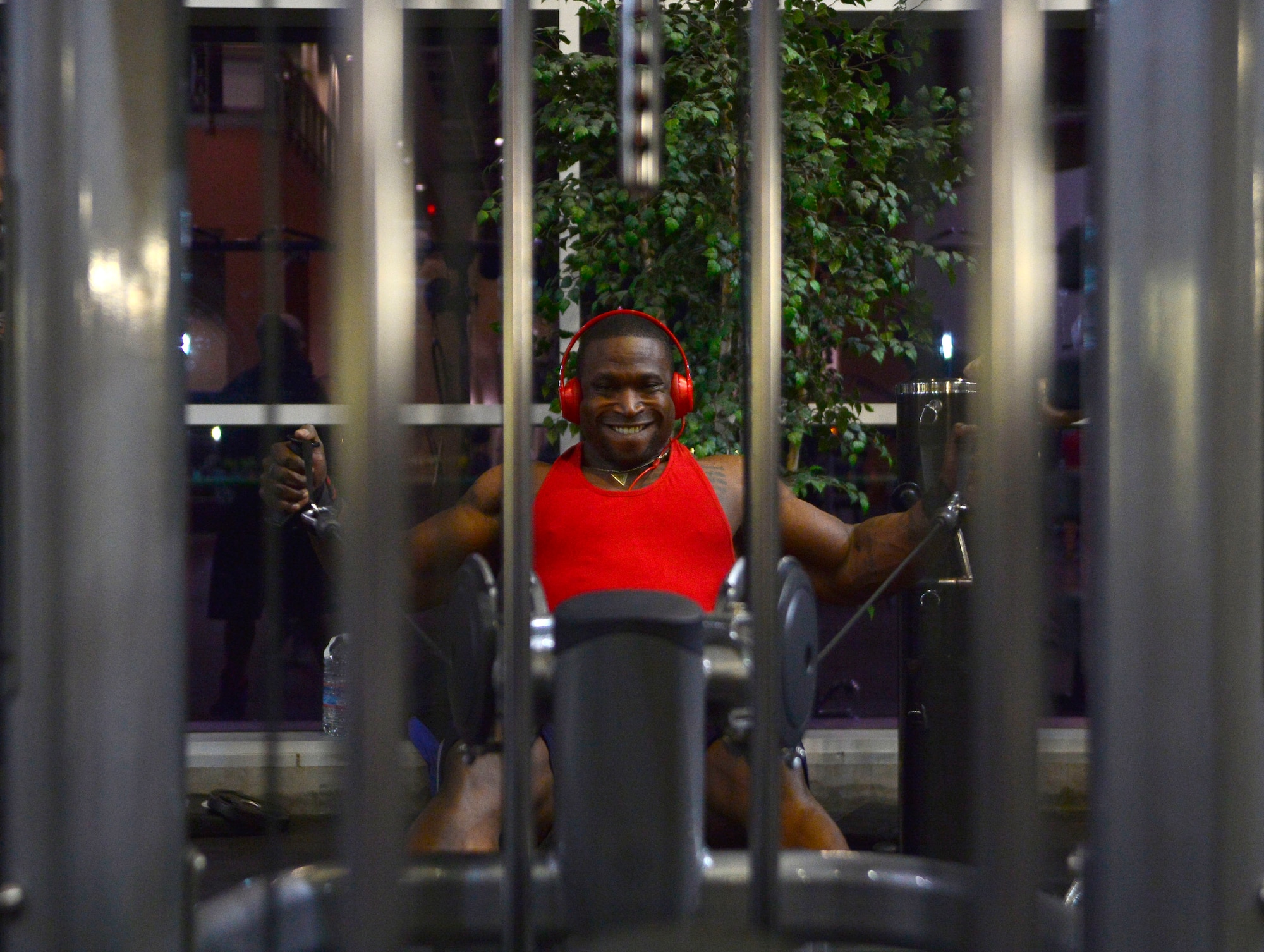 Tech. Sgt. David, 432nd Maintenance Group contract officer representative, performs rear deltoid fly’s during a workout Dec. 4, 2015, at Nellis Air Force Base, Nevada. David has been training for six years to be a professional body builder and recently earned his professional status after taking second place overall at the 2015 National Physique Committee National Bodybuilding Championships on Nov. 21, 2015.(U.S. Air Force photo by Airman 1st Class Christian Clausen/Released)